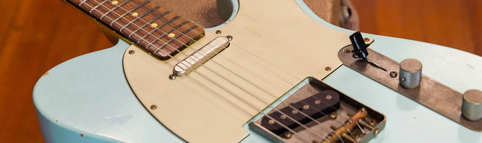 ObsidianWire Pickups with white covers on a a black stratocaster