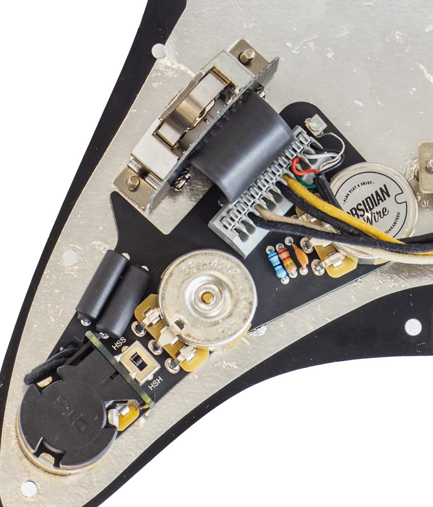 An ObsidianWire custom HSS wiring harness for Stratocaster is displayed from the bottom side to show the pots and Schaller switch that are used in its construction. The harness is on a Stratocaster pickguard, with a clear cut white background 